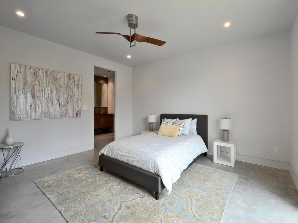 Foto de dormitorio actual sin chimenea con paredes blancas