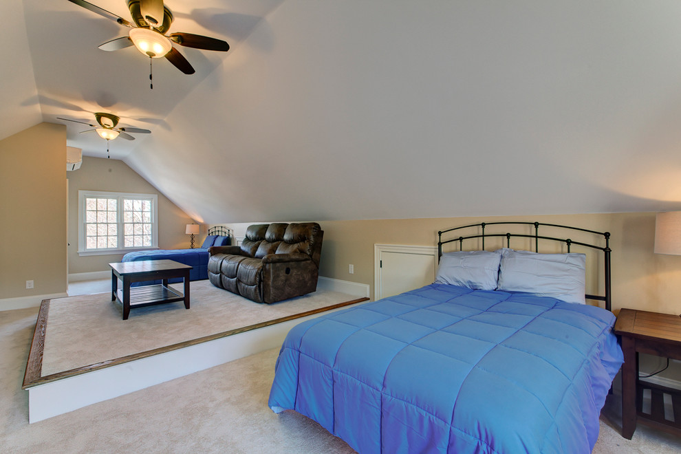 Medium sized classic mezzanine bedroom in Raleigh with beige walls, carpet and no fireplace.