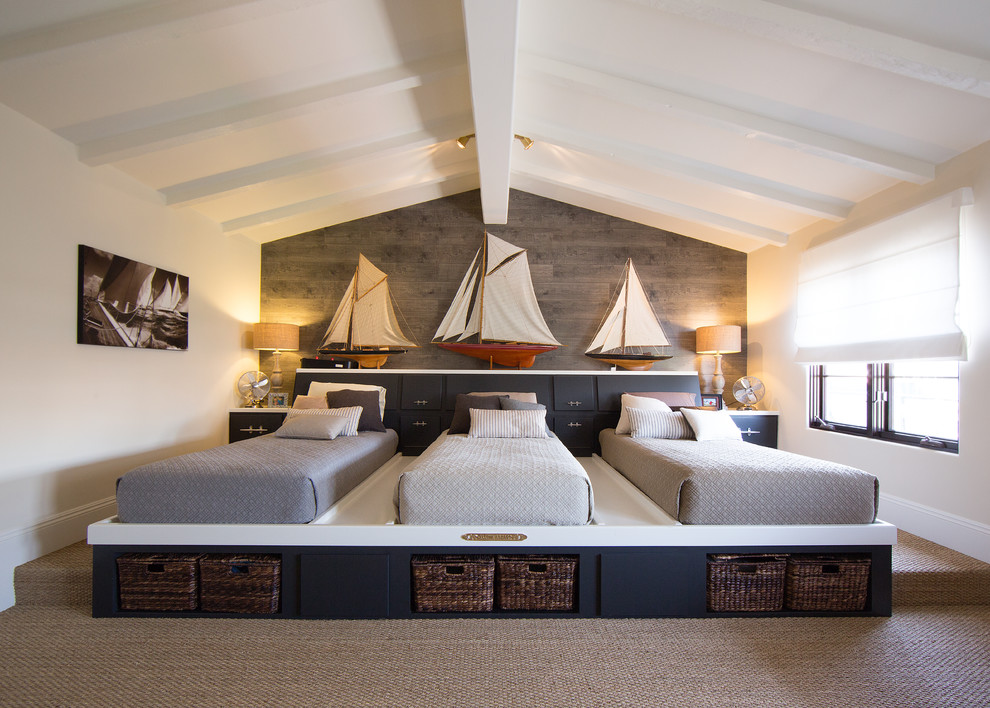 Example of a beach style carpeted bedroom design in Orange County with white walls