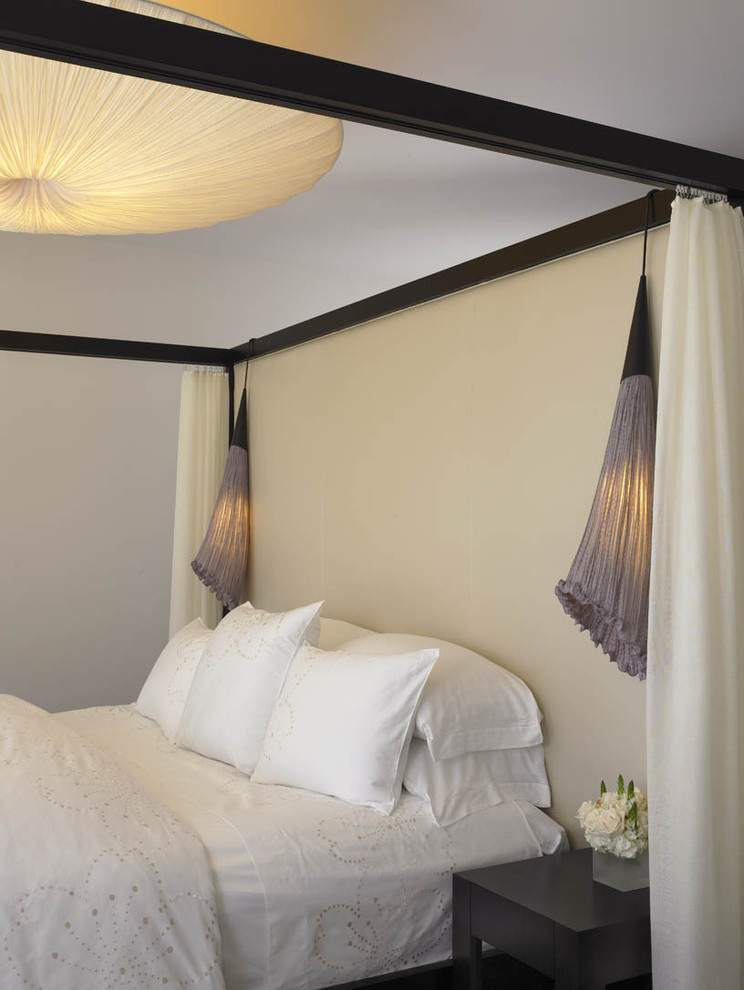Bedroom - modern bedroom idea in San Diego with beige walls