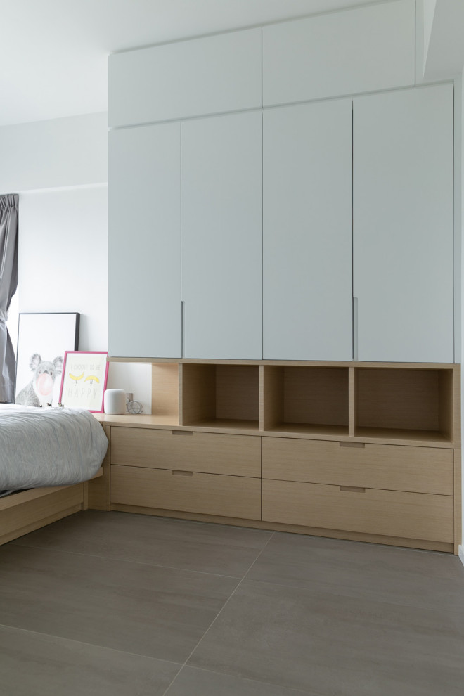 This is an example of a small modern master bedroom in Hong Kong with white walls, ceramic flooring and grey floors.