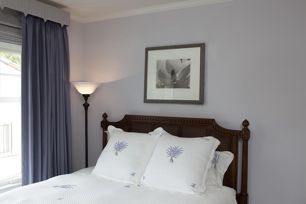 Elegant bedroom photo in San Francisco with gray walls