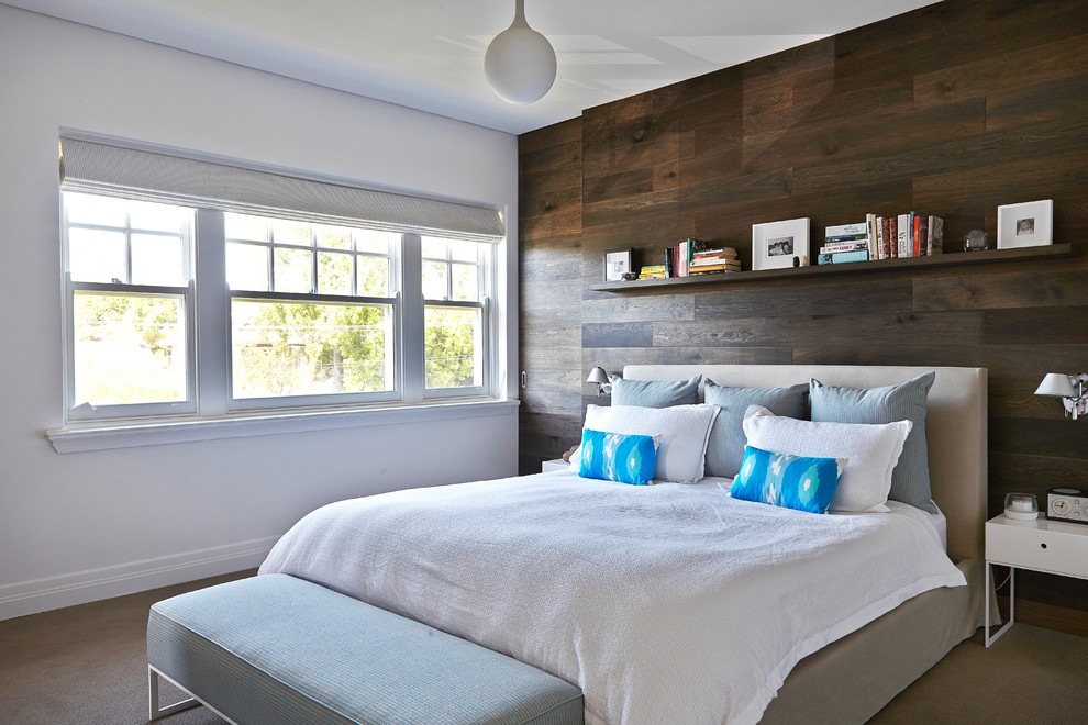 Inspiration for a contemporary carpeted bedroom remodel in Melbourne with white walls