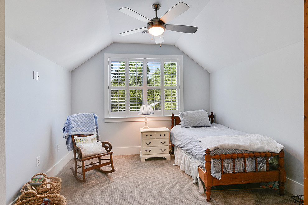 Mid-sized elegant guest carpeted bedroom photo in New Orleans with blue walls and no fireplace