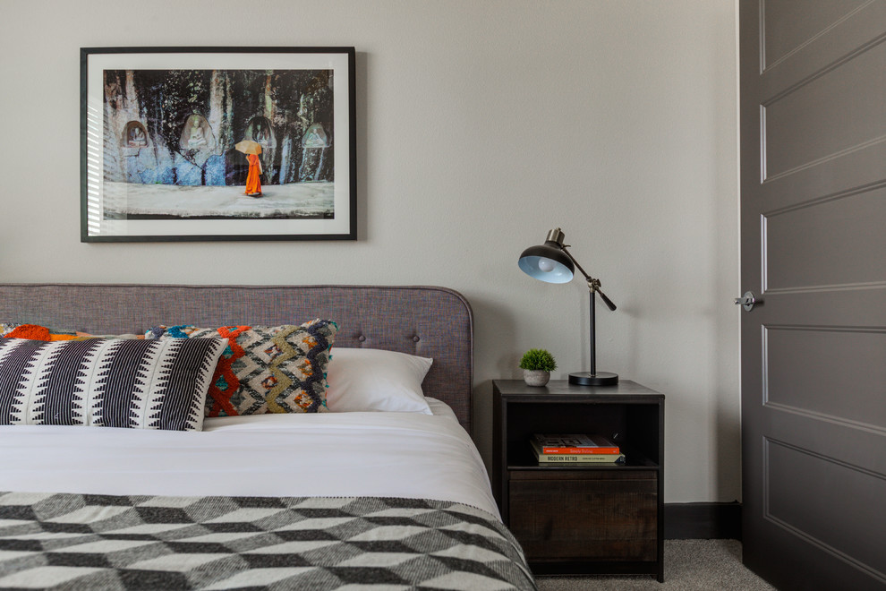 Inspiration for a contemporary carpeted and gray floor bedroom remodel in Austin with white walls