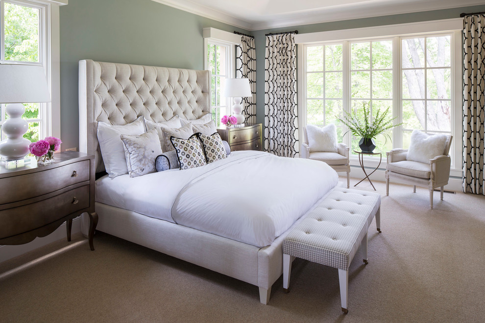 Example of a large transitional master carpeted bedroom design in Minneapolis with green walls and no fireplace