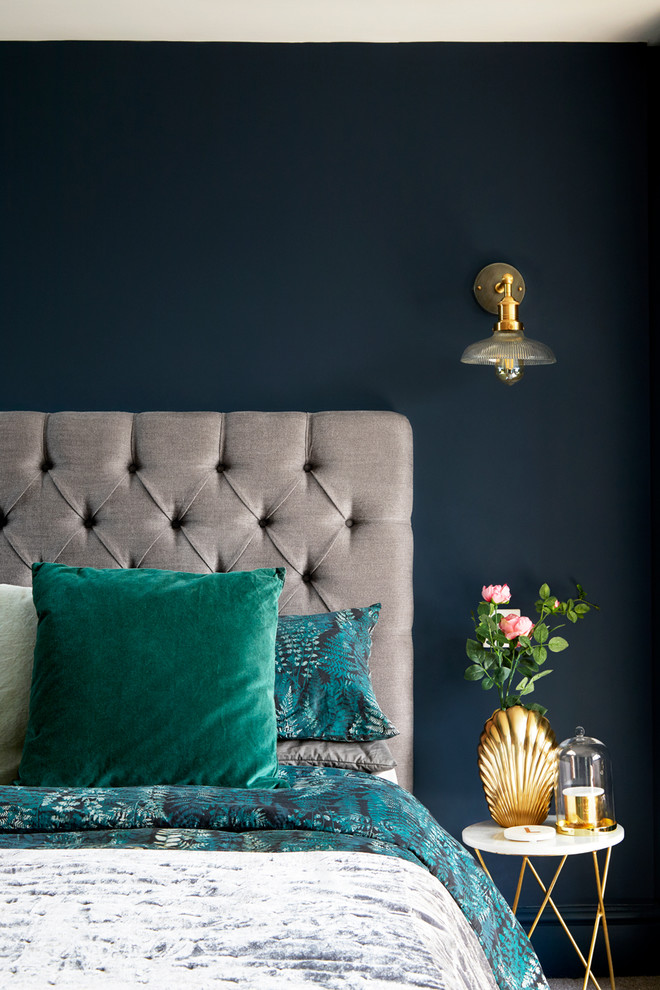 Inspiration for a small scandi master bedroom in London with blue walls and carpet.