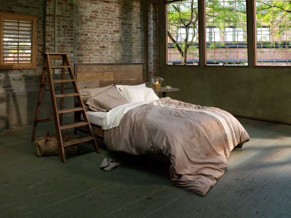 Photo of an urban bedroom in Vancouver.