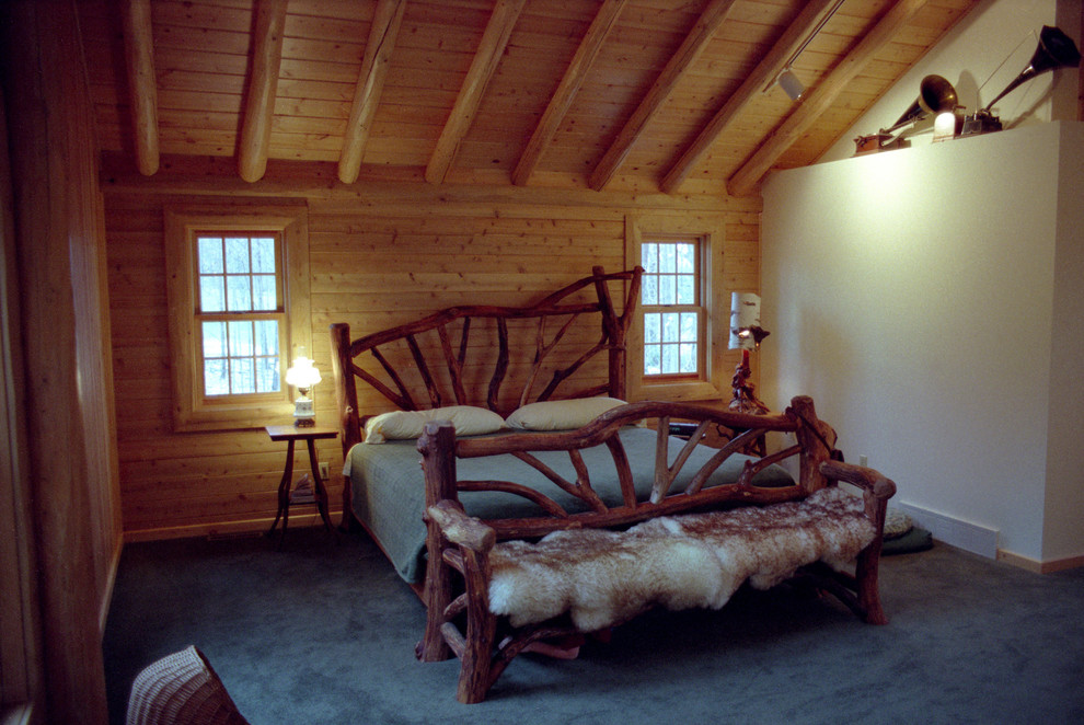 Photo of a rustic bedroom in Cleveland.