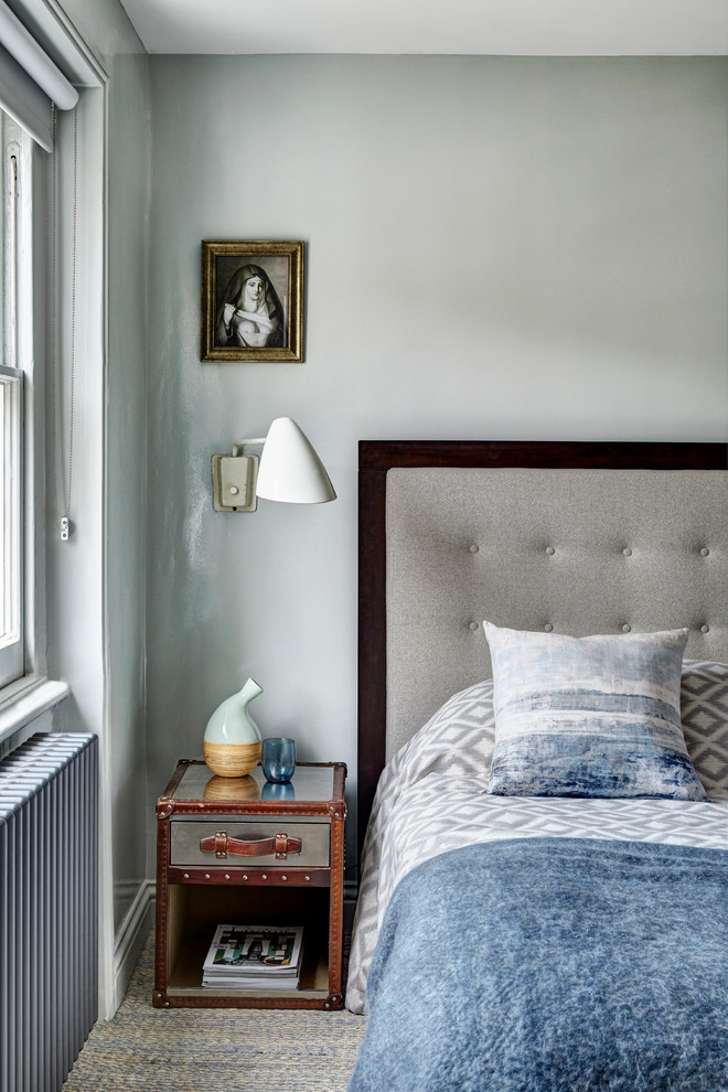 Photo of a traditional bedroom in London.