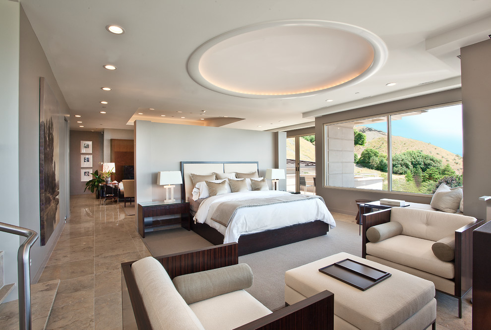 Inspiration for a contemporary master porcelain tile bedroom remodel in Salt Lake City with beige walls