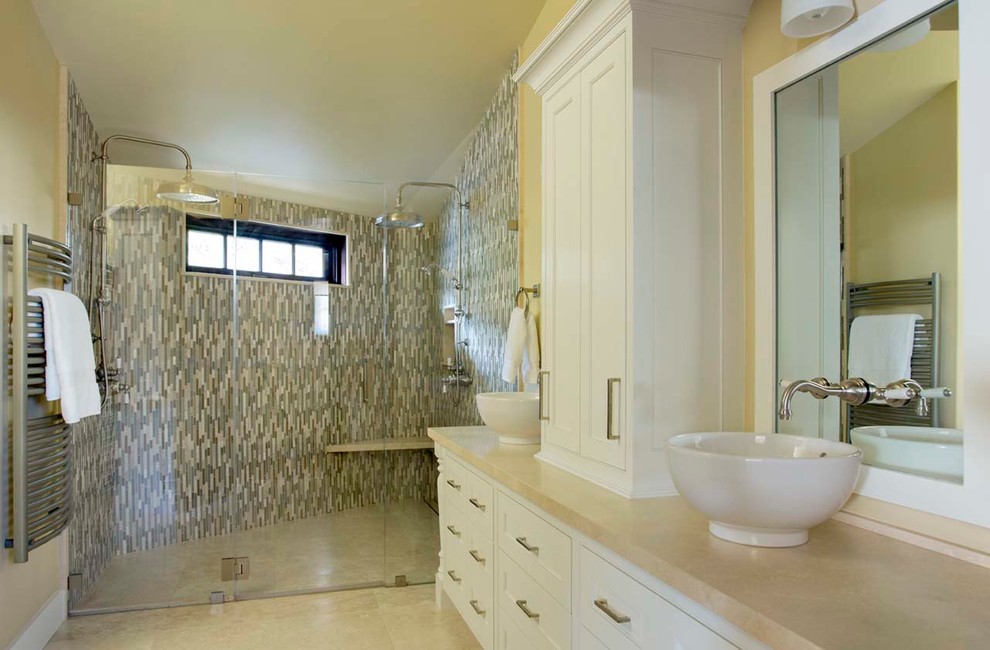 Inspiration for a large farmhouse bathroom in San Francisco with yellow walls and limestone flooring.