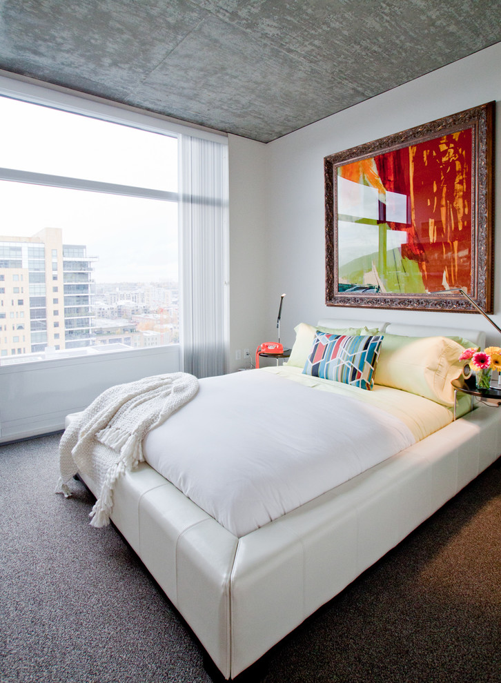 Inspiration for a mid-sized modern master carpeted and gray floor bedroom remodel in Portland with white walls