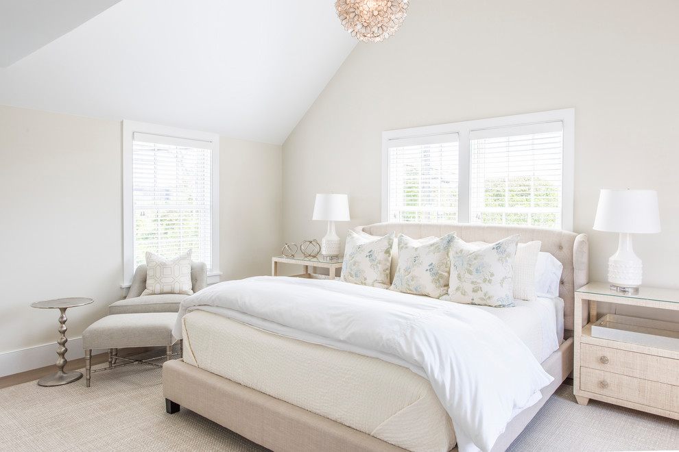 Medium sized coastal bedroom in Boston with beige walls.