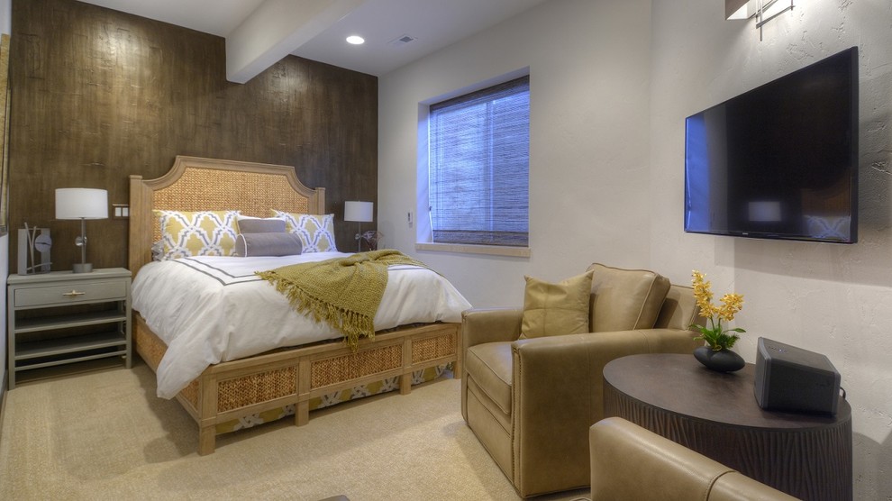 Diseño de habitación de invitados actual de tamaño medio con paredes grises y moqueta