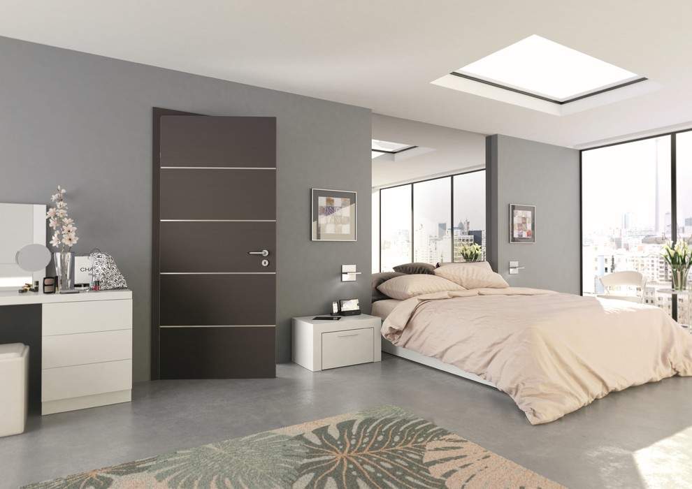 Großes Modernes Hauptschlafzimmer ohne Kamin mit grauer Wandfarbe, Betonboden und grauem Boden in Sonstige