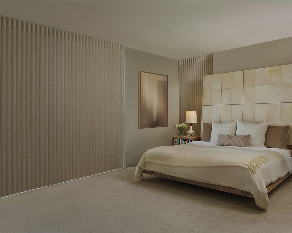 Design ideas for a medium sized contemporary master bedroom in Sacramento with beige walls, carpet and no fireplace.