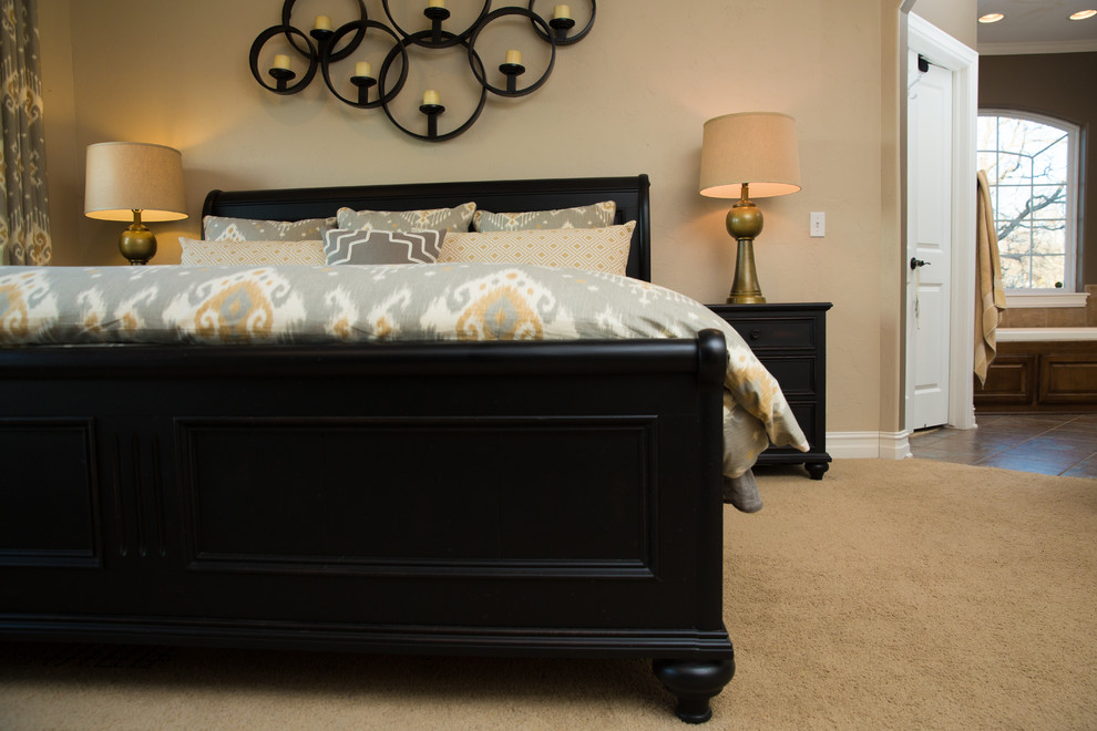Photo of a medium sized country master bedroom in Other with beige walls and carpet.