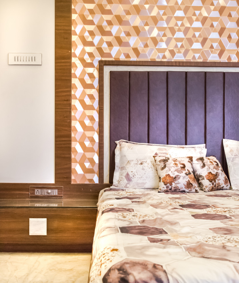 Photo of a bohemian guest bedroom in Pune with beige walls, marble flooring and beige floors.
