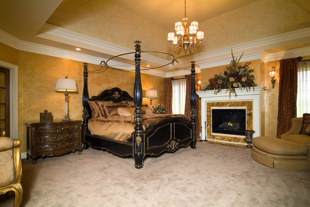 Large elegant master carpeted bedroom photo in Chicago with beige walls, a standard fireplace and a tile fireplace