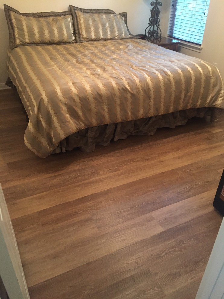 Luxury Vinyl Plank Flooring + Backsplash Contemporary Bedroom