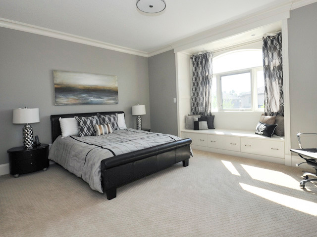 Example of a trendy carpeted bedroom design in Edmonton with gray walls