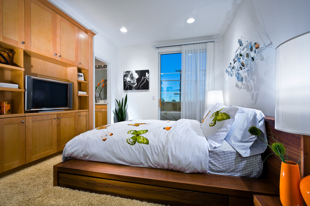 Example of a trendy bedroom design in Orange County with white walls