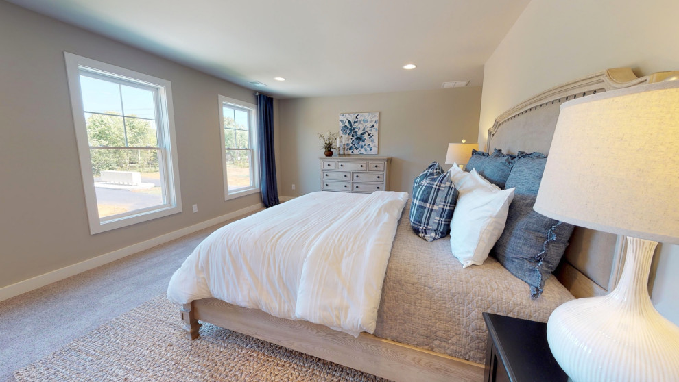 Foto de dormitorio principal de estilo americano de tamaño medio con paredes grises, suelo de cemento y suelo gris