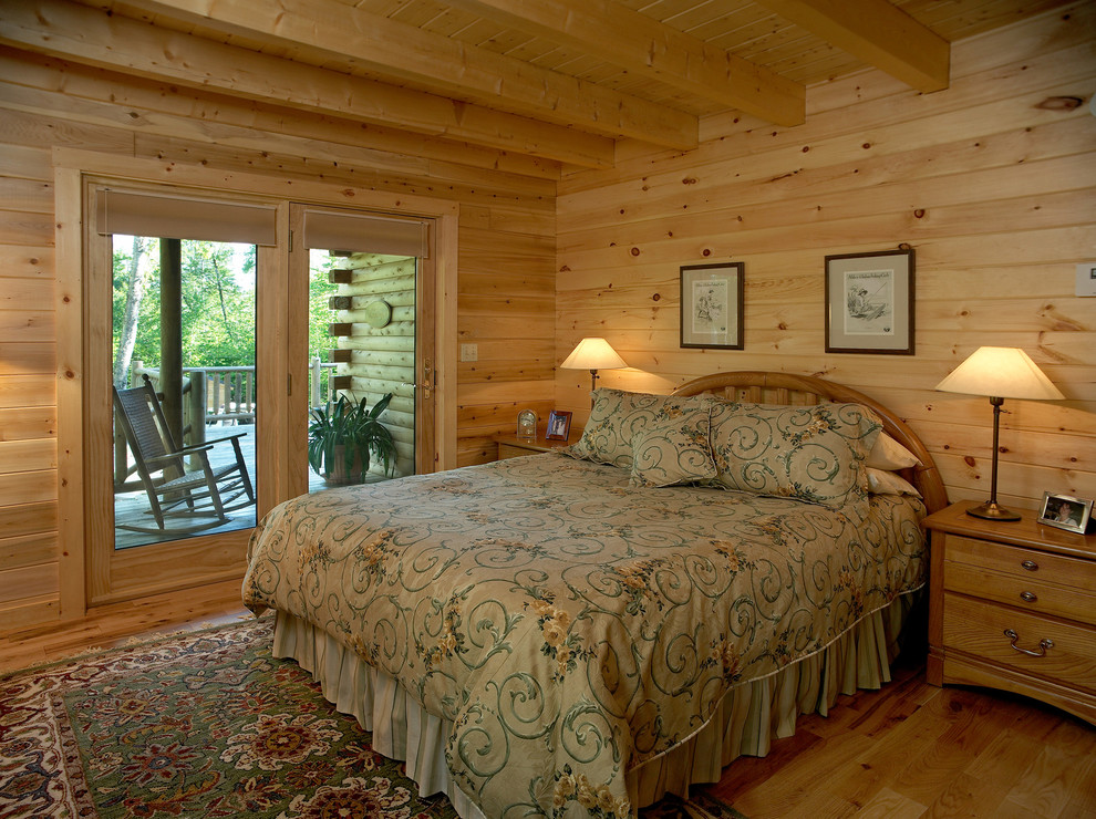 Photo of a rustic guest bedroom in Portland Maine.