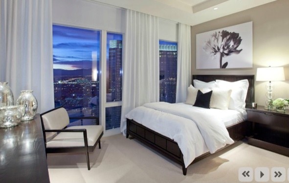 Example of a transitional bedroom design in Las Vegas