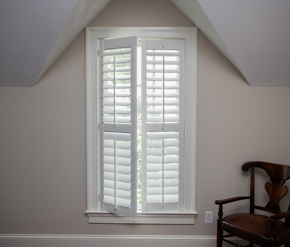 Example of a classic guest dark wood floor bedroom design in Charleston