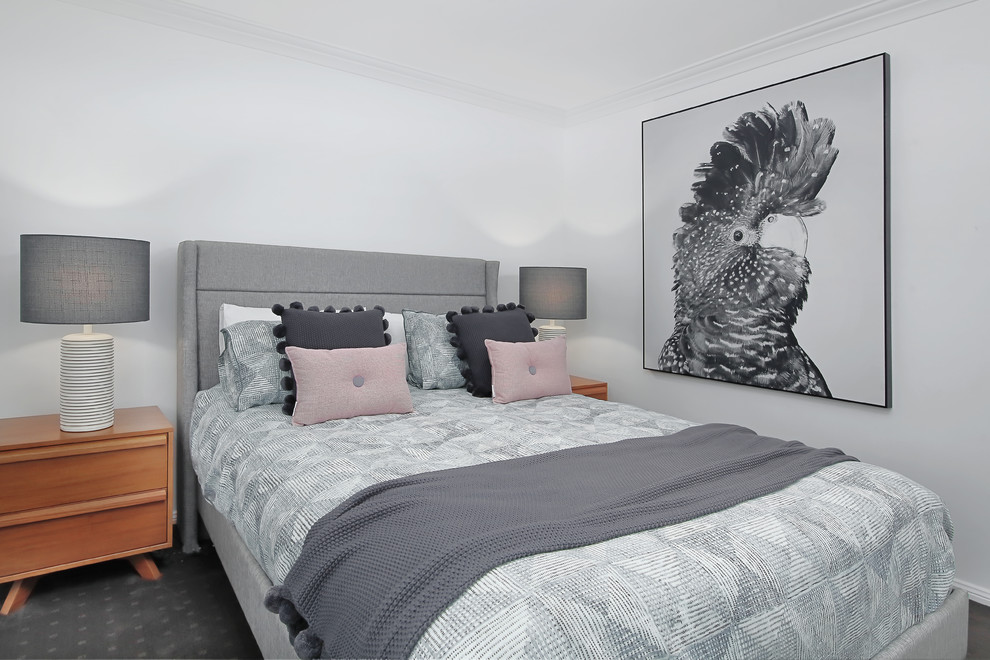 Diseño de dormitorio actual con paredes blancas, moqueta y suelo gris