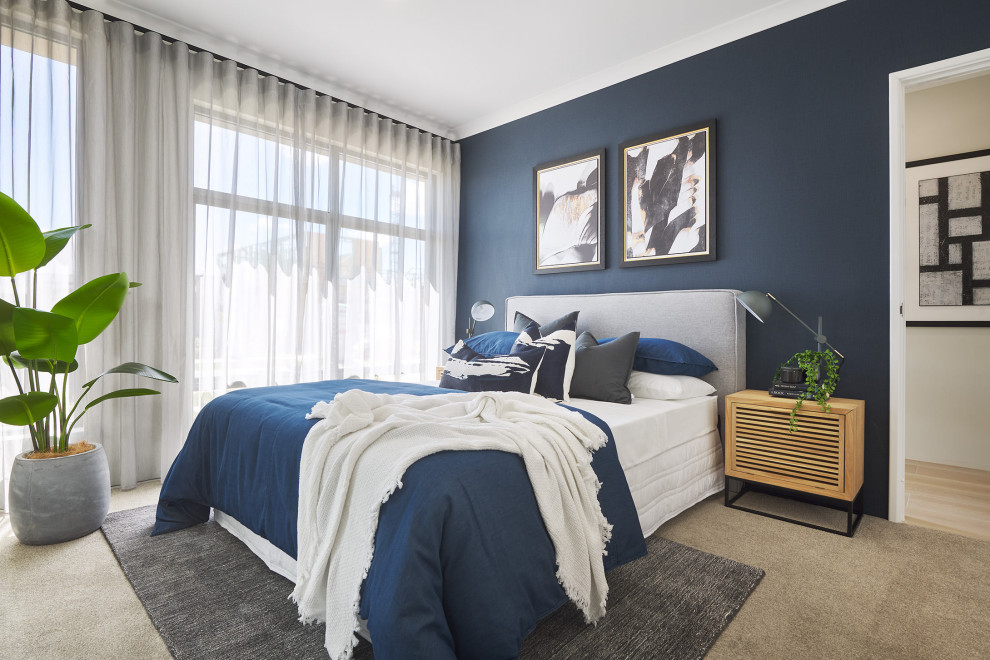 Ispirazione per una camera da letto contemporanea con pareti blu, moquette e pavimento grigio