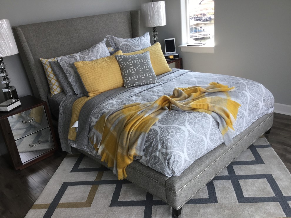 Design ideas for a medium sized classic guest bedroom in Austin with grey walls and dark hardwood flooring.