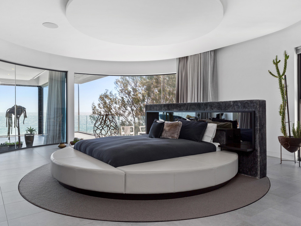 Bedroom - contemporary gray floor bedroom idea in Perth with gray walls