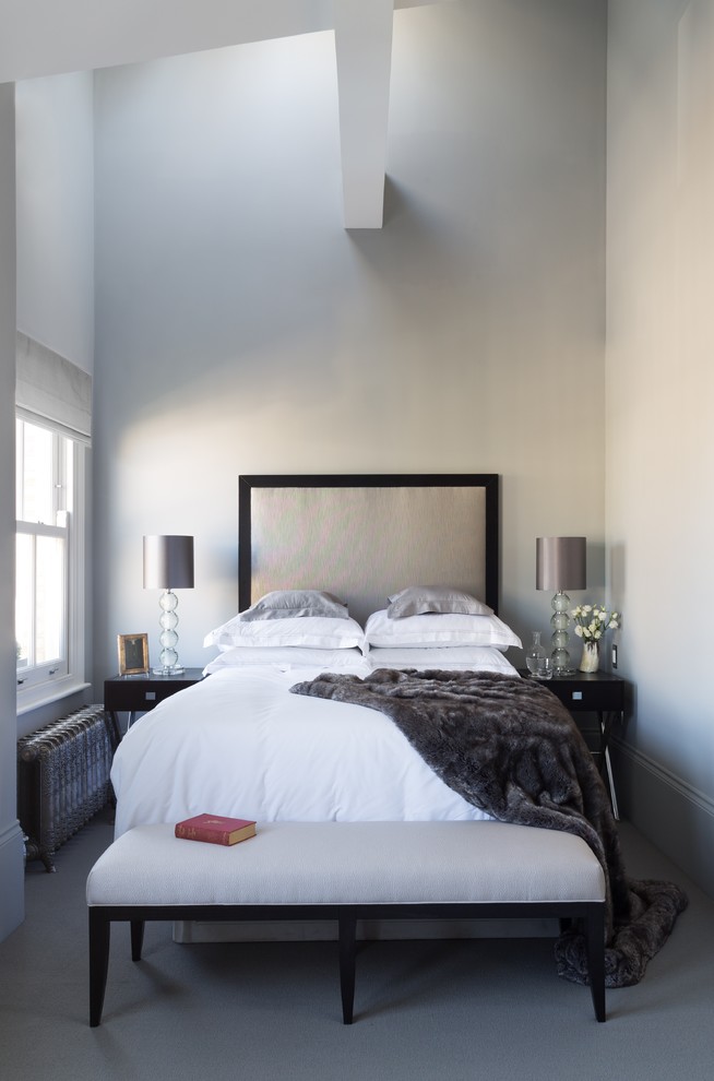 Inspiration for a mid-sized contemporary carpeted and gray floor bedroom remodel in London with gray walls