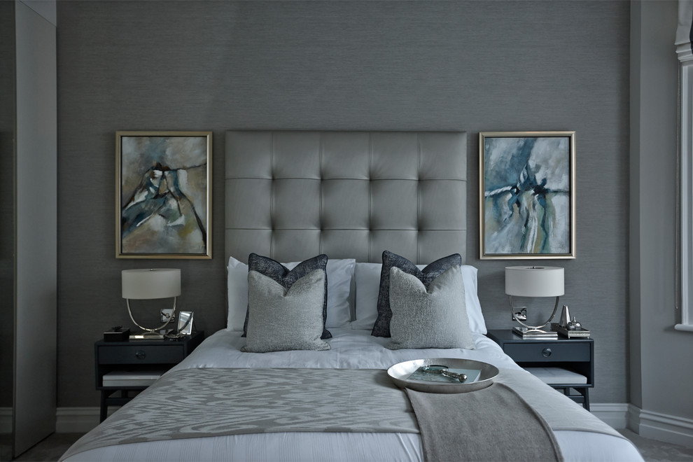 Contemporary grey and silver bedroom in London.
