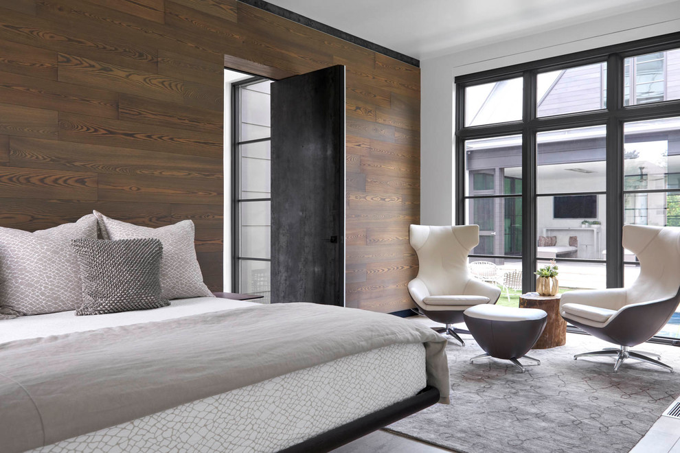 Пример оригинального дизайна: большая хозяйская спальня в современном стиле с белыми стенами, бетонным полом и серым полом без камина