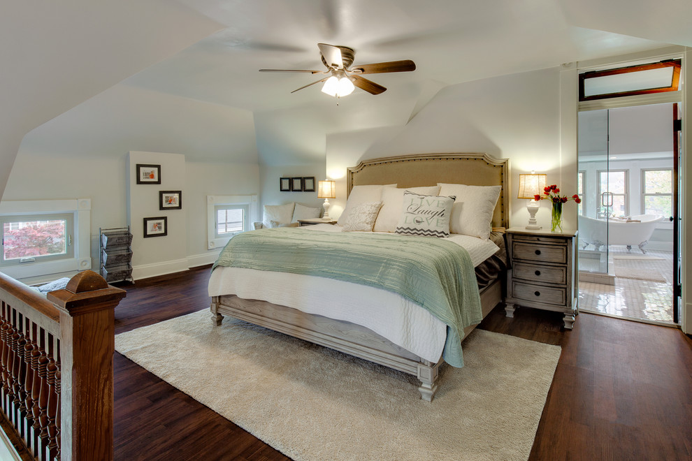Design ideas for a medium sized contemporary master bedroom in Columbus with grey walls, medium hardwood flooring and no fireplace.
