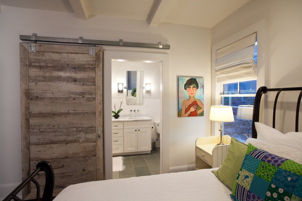 Bedroom - large contemporary master bedroom idea in New York with white walls