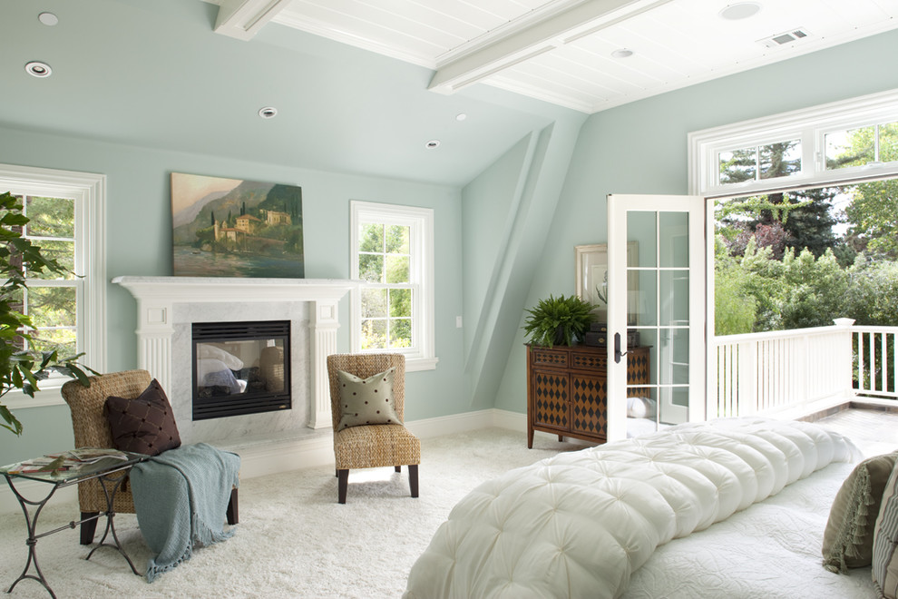 Elegant bedroom photo in San Francisco with blue walls