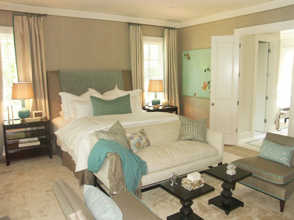 This is an example of a large traditional master bedroom in Atlanta with beige walls and no fireplace.