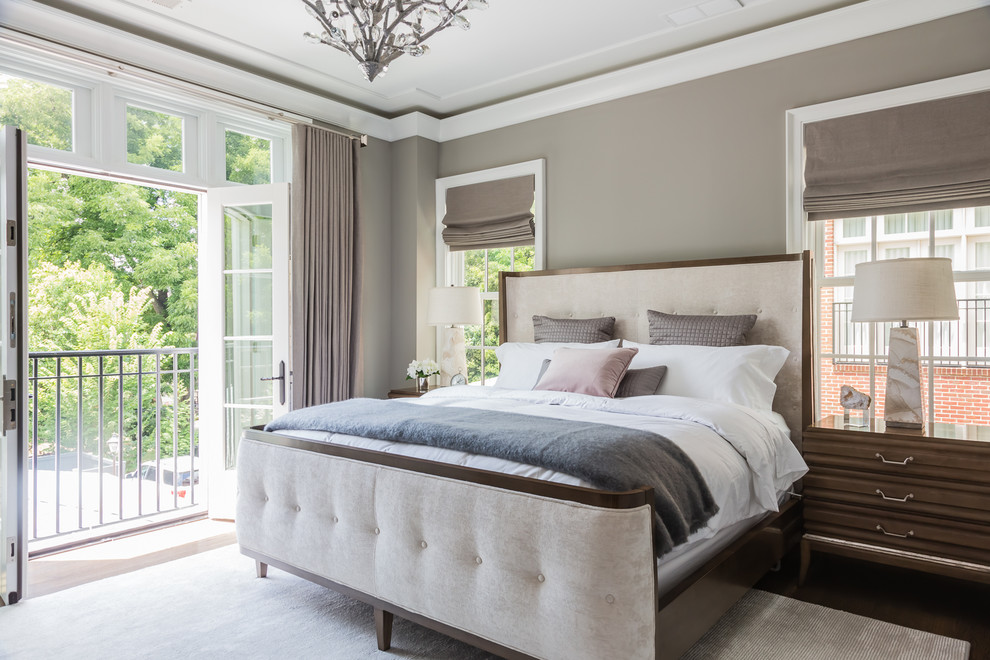 Inspiration for a transitional master bedroom remodel in Raleigh with gray walls