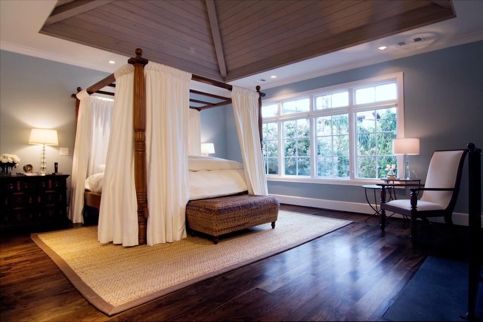 Inspiration for a large eclectic master dark wood floor bedroom remodel in Houston with blue walls