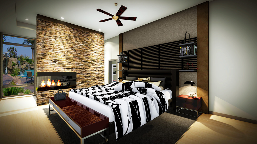 Großes Modernes Hauptschlafzimmer mit beiger Wandfarbe, hellem Holzboden, Eckkamin, Kaminumrandung aus Stein und beigem Boden in Austin