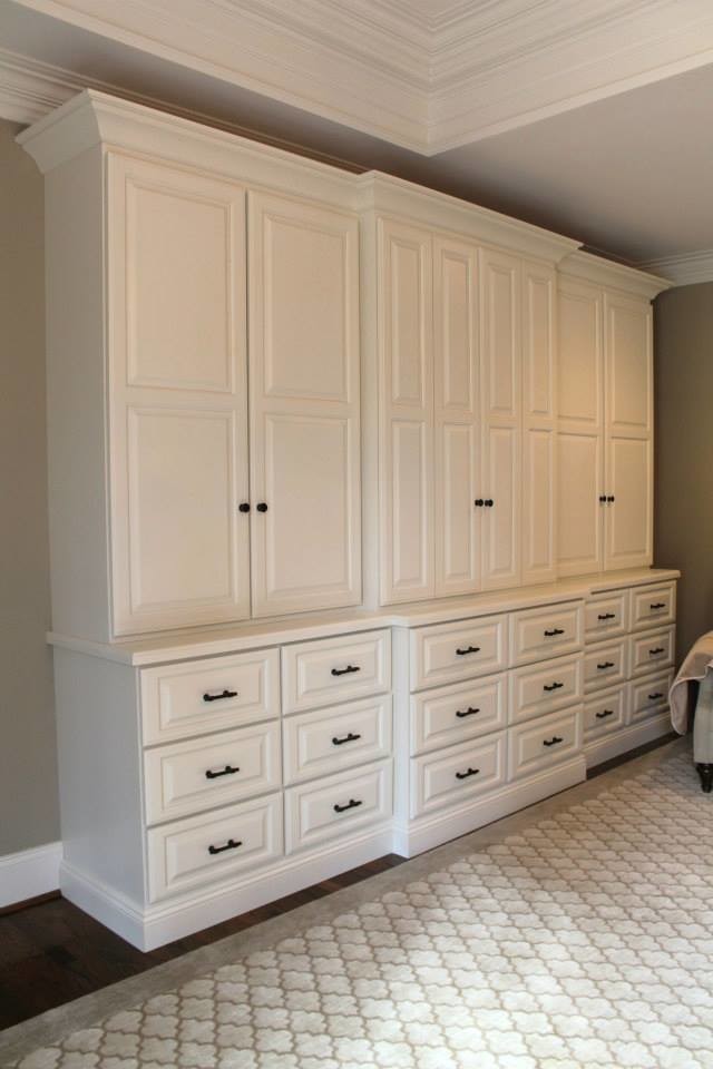 Example of a transitional master bedroom design in Other