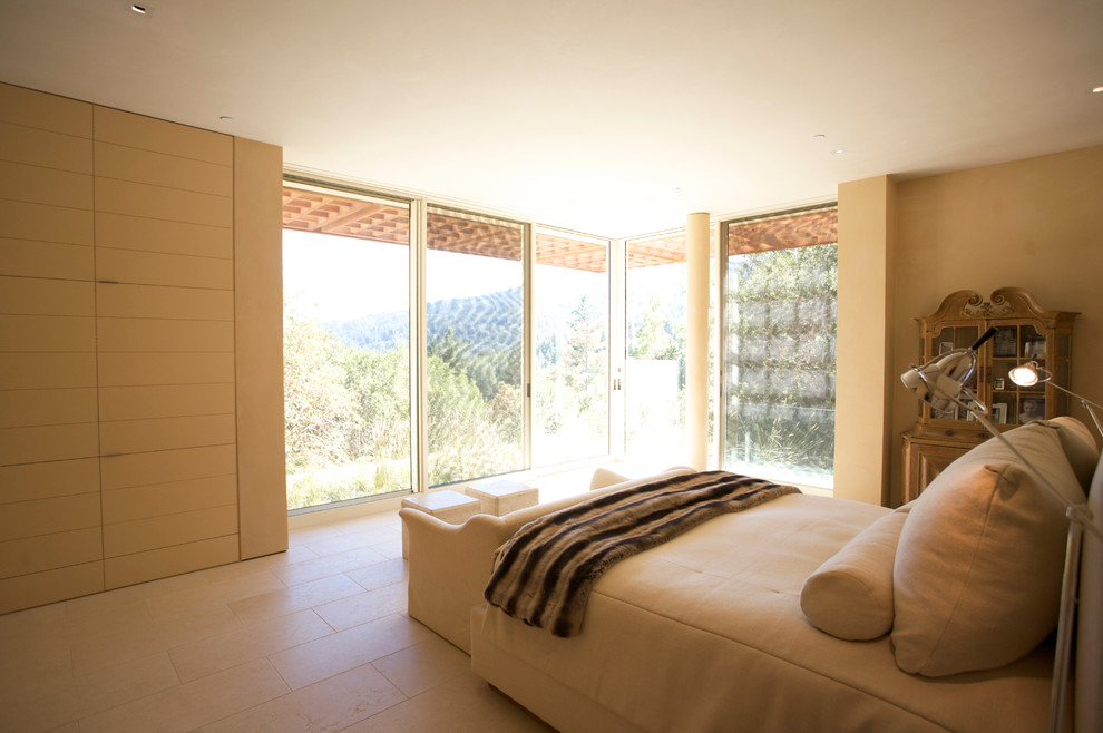 Large contemporary master bedroom in San Francisco with beige walls.