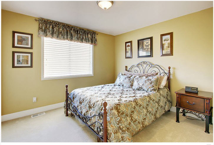 This is an example of a medium sized traditional bedroom in Austin.