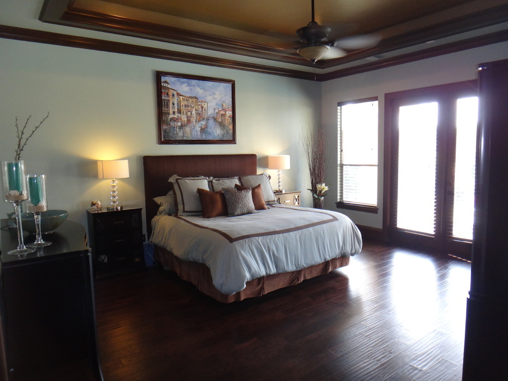 Example of a tuscan bedroom design in Dallas