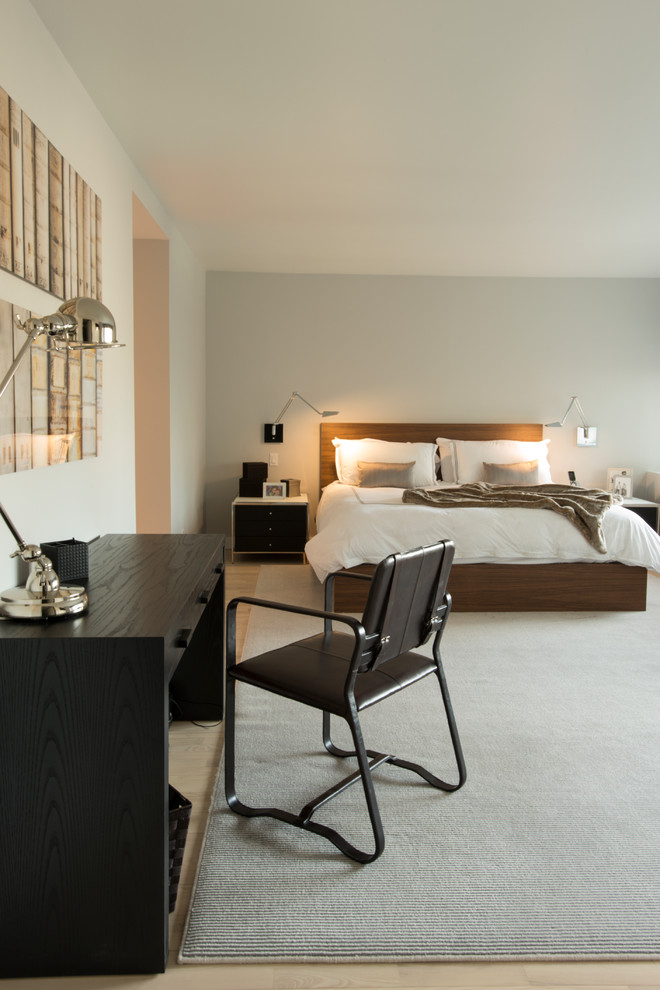 Trendy master bedroom photo in New York with beige walls